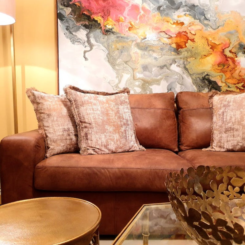 What colour goes with brown leather sofa ?